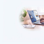 Person using a laptop displaying Nodaway Valley Bank’s online banking login page.